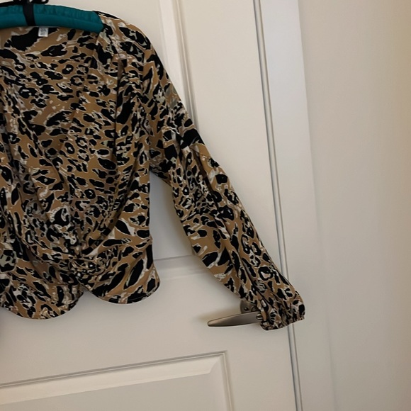 Small Women’s animal print blouse with the V-neck - Picture 2 of 4